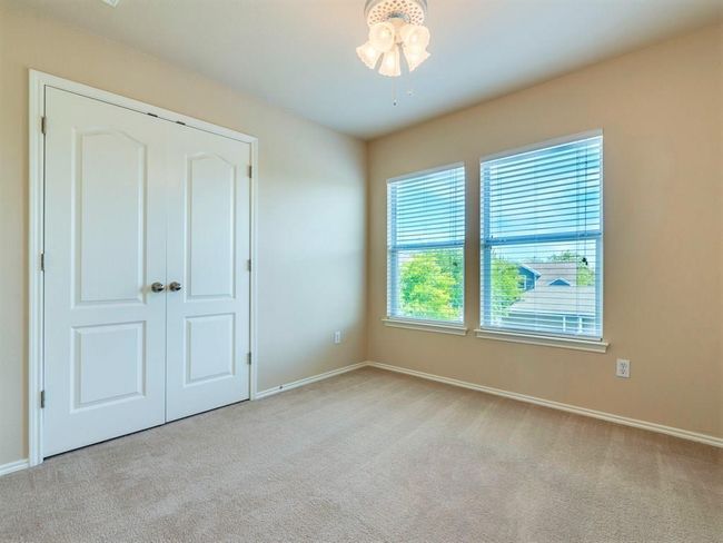 The other secondary bedroom upstairs. | Image 21