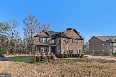 2214 Golden Eagle Drive, House other with 5 bedrooms, 4 bathrooms and 2 parking in Locust Grove GA | Image 2