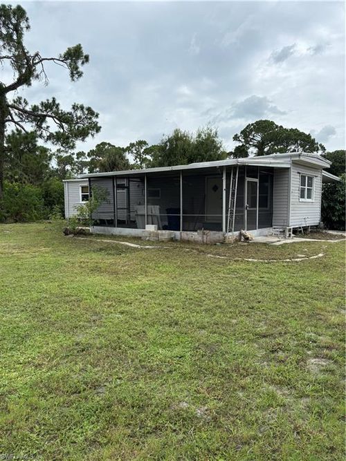 7689 Ebson Dr, NORTH FORT MYERS, FL, 33917-6254 | Card Image