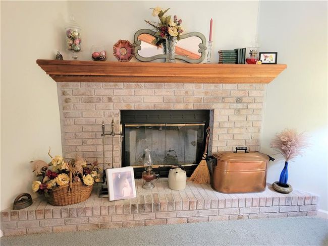Wood burning fireplace with mantel | Image 8