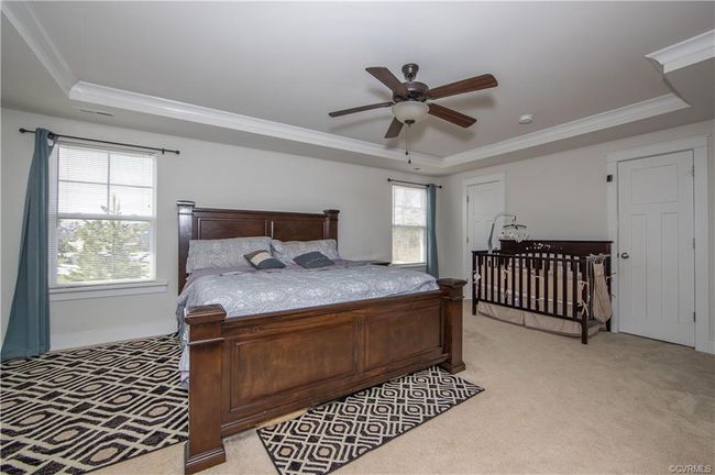 Large primary bedroom with 2 walk in closets!! | Image 16