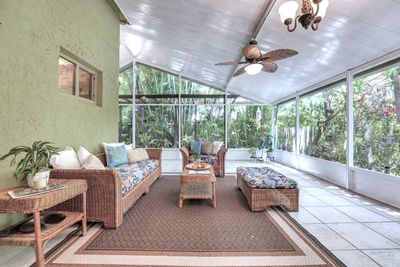 The large Florida-Room style patio creates a Zen-like indoor-outdoor space to relax. | Image 2