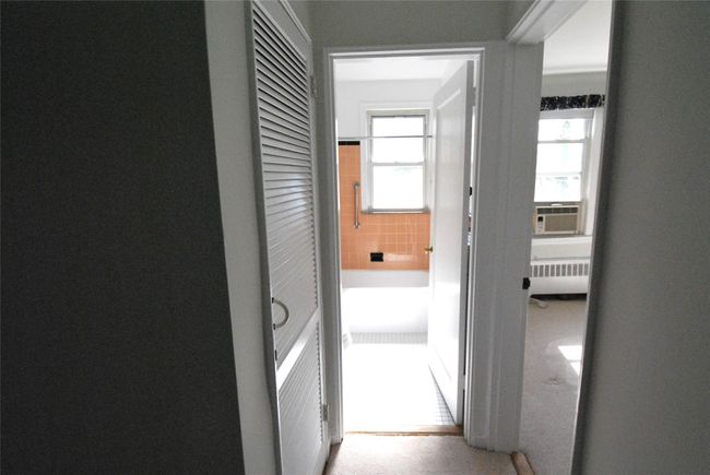 Hallway entrance to Bathroom | Image 9