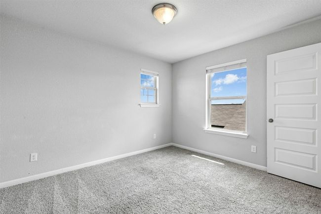 Spare room with carpet and baseboards | Image 32
