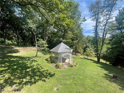 View of yard featuring an outbuilding | Image 2