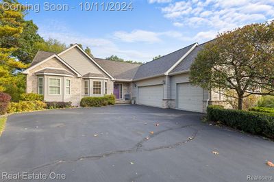 13105 Cove Ridge Drive, Home with 3 bedrooms, 3 bathrooms and null parking in Green Oak Twp MI | Image 1