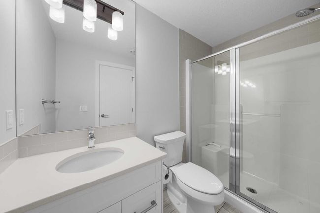 244 Boulder Creek Crescent Se, House other with 4 bedrooms, 4 bathrooms and 4 parking in Langdon AB | Image 43