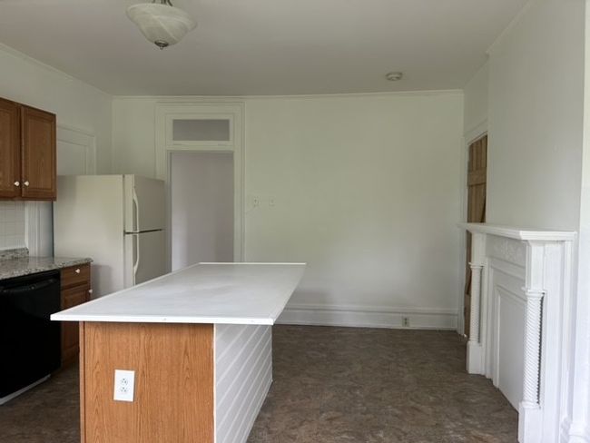 Island and decorative fireplace | Image 7