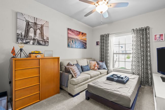 Living area featuring carpet flooring and ceiling fan | Image 24