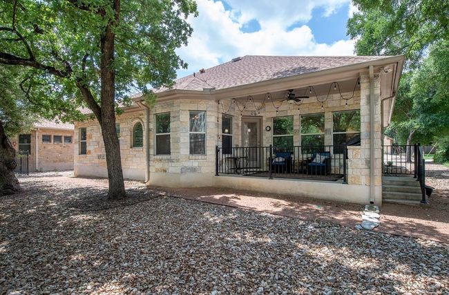 Easy maintenance with this Xeriscape yard and full gutters | Image 27