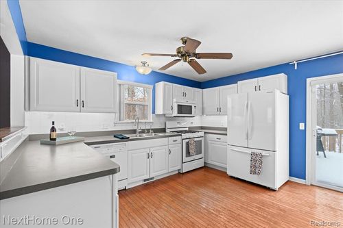 10128 Elmira St, Pinckney, MI, 48169-8496 | Card Image