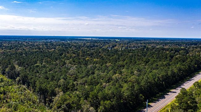 0 Highway 105, Home with 0 bedrooms, 0 bathrooms and null parking in Hull TX | Image 18