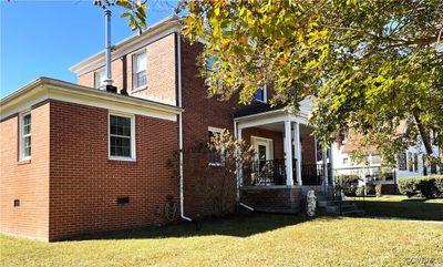 A photo from the home's left front exterior. | Image 3