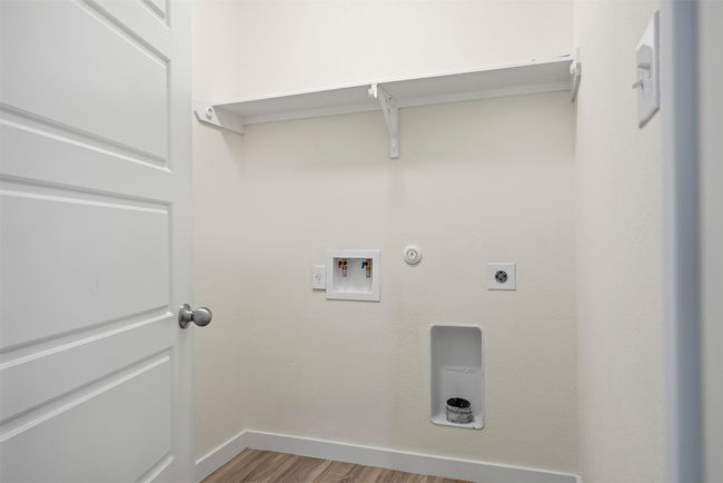Laundry room on the main floor | Image 18