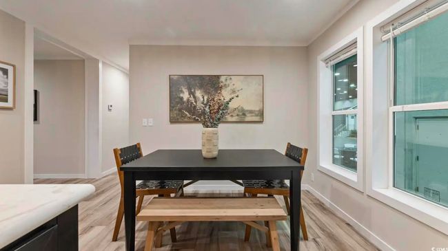 Dining area with light wood-type flooring and baseboards | Image 16