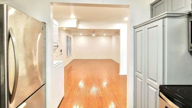 Hallway featuring light hardwood / wood-style floors | Image 8