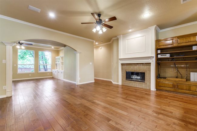View of den looking into second living area. | Image 17