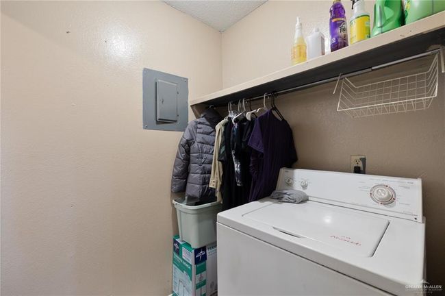 Washroom featuring washer / dryer and electric panel | Image 8
