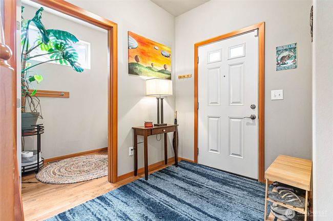 Welcoming entryway w/ powder room | Image 12