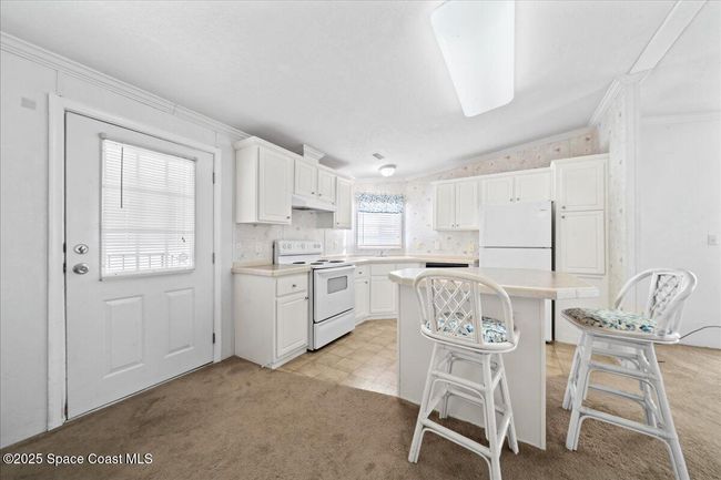 641 Hyacinth Cir, House other with 2 bedrooms, 2 bathrooms and null parking in Barefoot Bay FL | Image 4