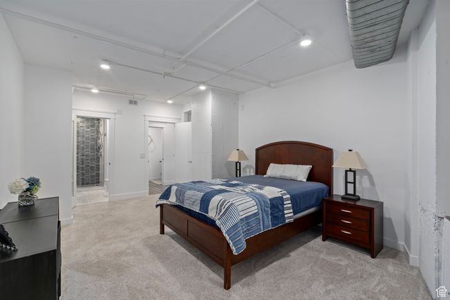 Bedroom #2 featuring light colored carpet | Image 31