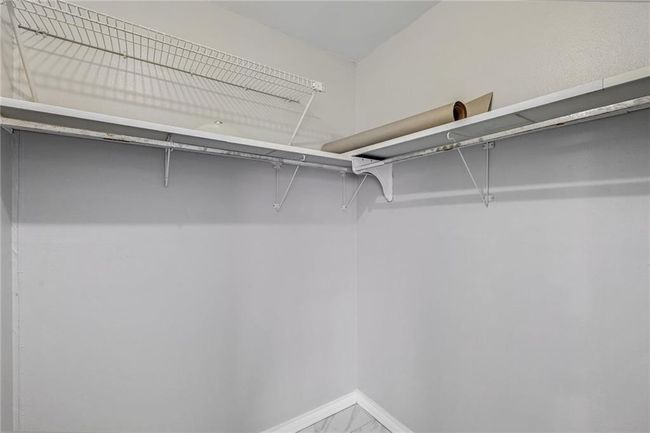 Walk in closet with marble look tiles | Image 18