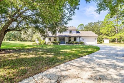 6551 Bogie Court, House other with 5 bedrooms, 2 bathrooms and null parking in Wesley Chapel FL | Image 2