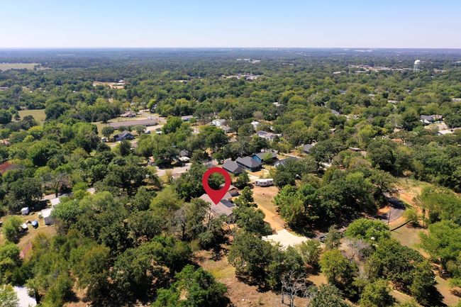 Trees are a big part of the Denison landscape. This home is tucked into its own private space at literally "the top of the city of Denison." | Image 15