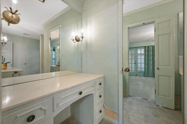 Bathroom with ornamental molding and vanity | Image 24