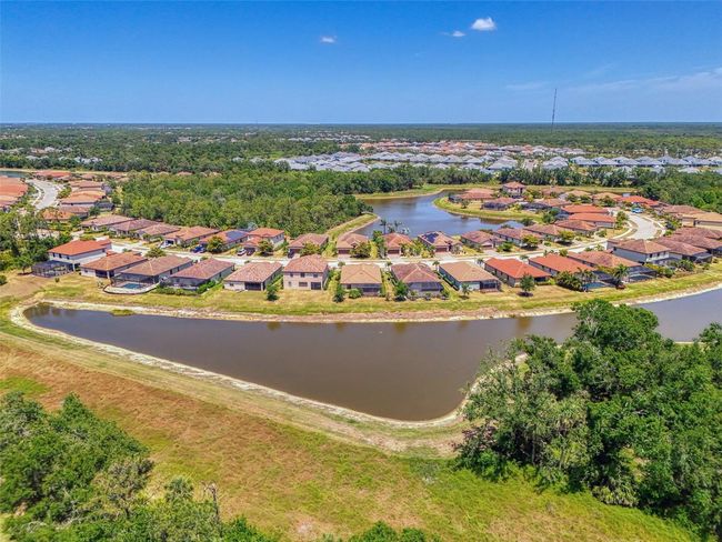 12315 Canavese Ln, House other with 4 bedrooms, 3 bathrooms and null parking in Venice FL | Image 57