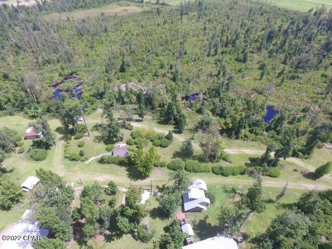 10012 Sw Windsong Way, Home with 3 bedrooms, 3 bathrooms and null parking in Blountstown FL | Image 84