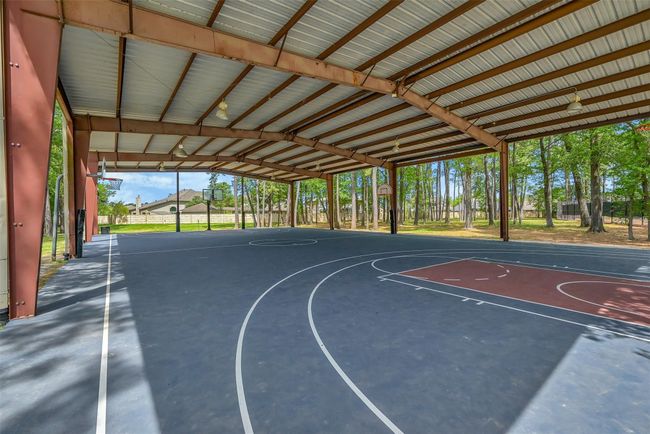 Walking distance to full size covered basketball court | Image 23