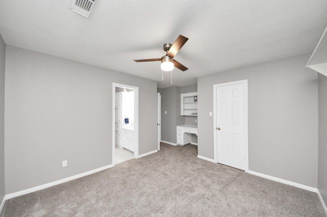 Bedroom 2 with built-in desk sharing Hollywood Bath | Image 27