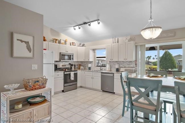 Spacious eat in Kitchen leading to lanai | Image 4