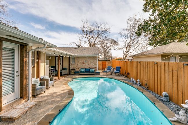 Anther view of the pool; the door is from the secondary bedroom with the ensuite bath. | Image 25