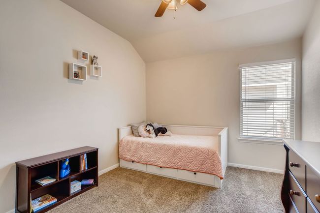 Bedroom featuring carpet, lofted ceiling, and a ceiling fan | Image 20