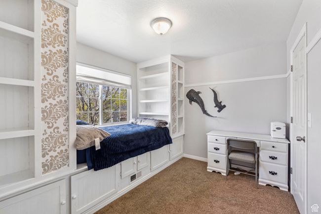 Bedroom featuring visible vents and carpet | Image 22