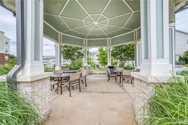 View of patio featuring outdoor dining area | Image 32