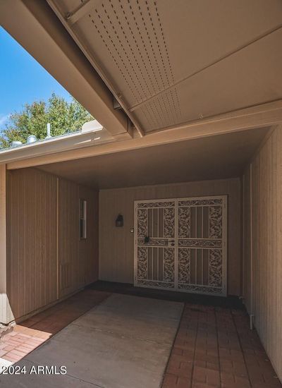 Shaded, double-door front entry off courtyard | Image 3