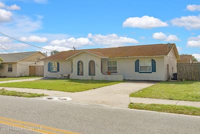 659 School Street, Home with 4 bedrooms, 2 bathrooms and null parking in Cocoa FL | Image 2