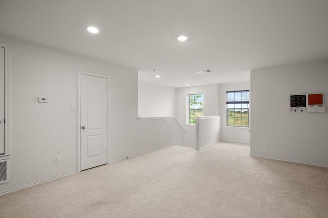 Spare room with carpet flooring, recessed lighting, baseboards, and visible vents | Image 26