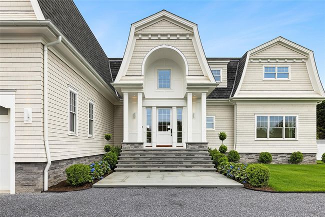 Doorway to property with a gambrel roof | Image 48