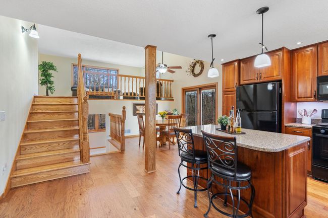 The floorplan allows for maximum entertaining with views of 3 floors from the kitchen and dining room. | Image 6
