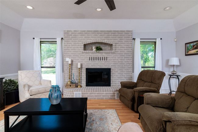 Living Room with Wood-Burning Fireplace | Image 12