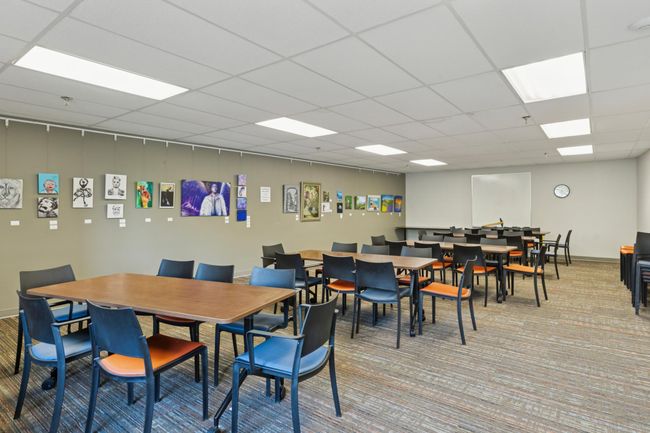 Lower level community room with look out windows to the back yard | Image 60