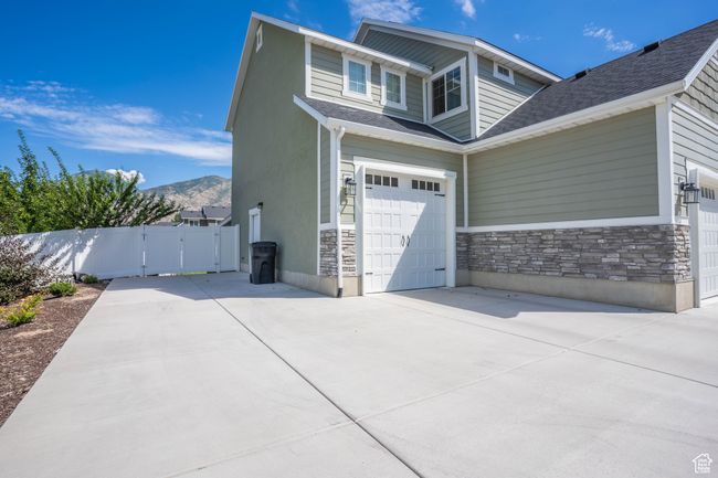 3rd Car Garage and RV Parking pad.Exterior Photos taken from previous season | Image 9