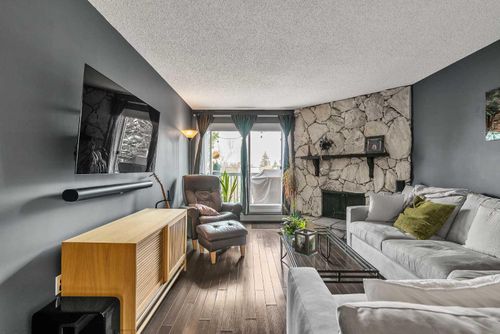 305-1001 68 Ave Sw, Calgary, AB, T2V4X1 | Card Image