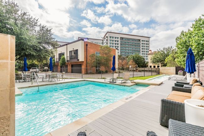 Soak up the sun or sip cocktails poolside in this expansive outdoor lounge—complete with shaded umbrellas, elegant furniture, and a picture-perfect backdrop. | Image 18