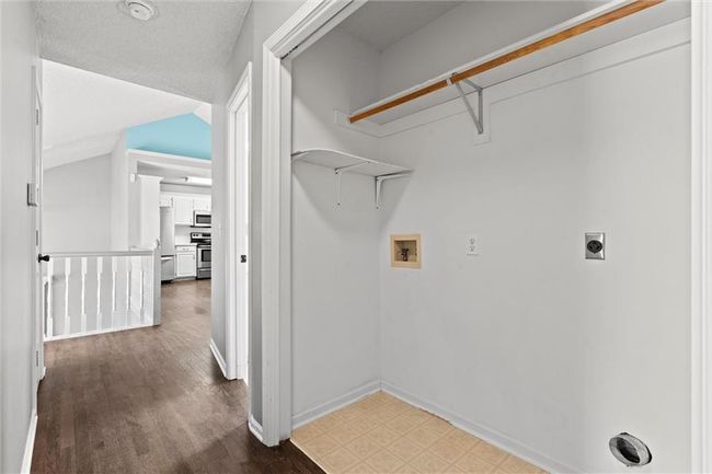Laundry area with hookup for an electric dryer and hookup for a washing machine | Image 29