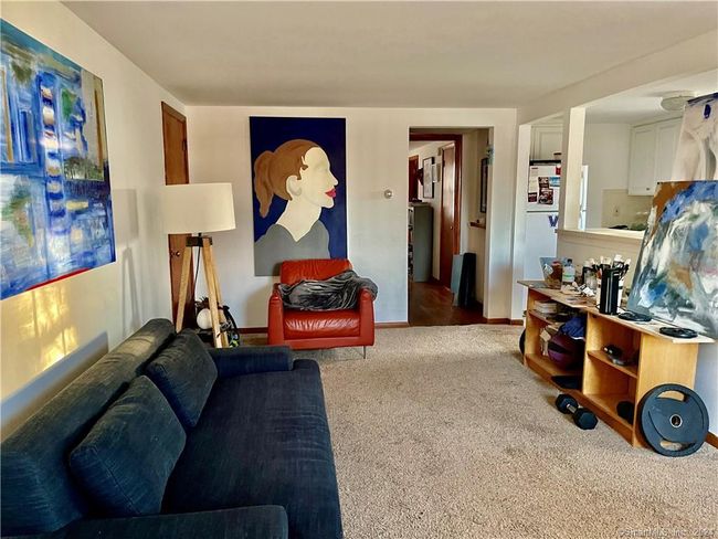 Living room is open to Kitchen &amp; hall to Bedroom in upstairs apartment | Image 23